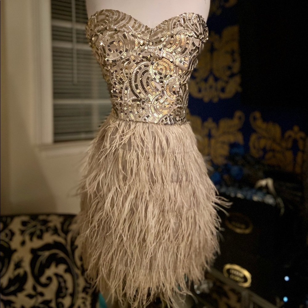 Sequin, feathered BEBE strapless dress in a taupe/tanish color